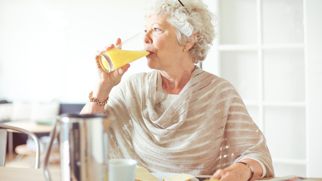 Elderly Woman Hydrating | Preventing Heat Stroke in Seniors | All Seasons Homecare