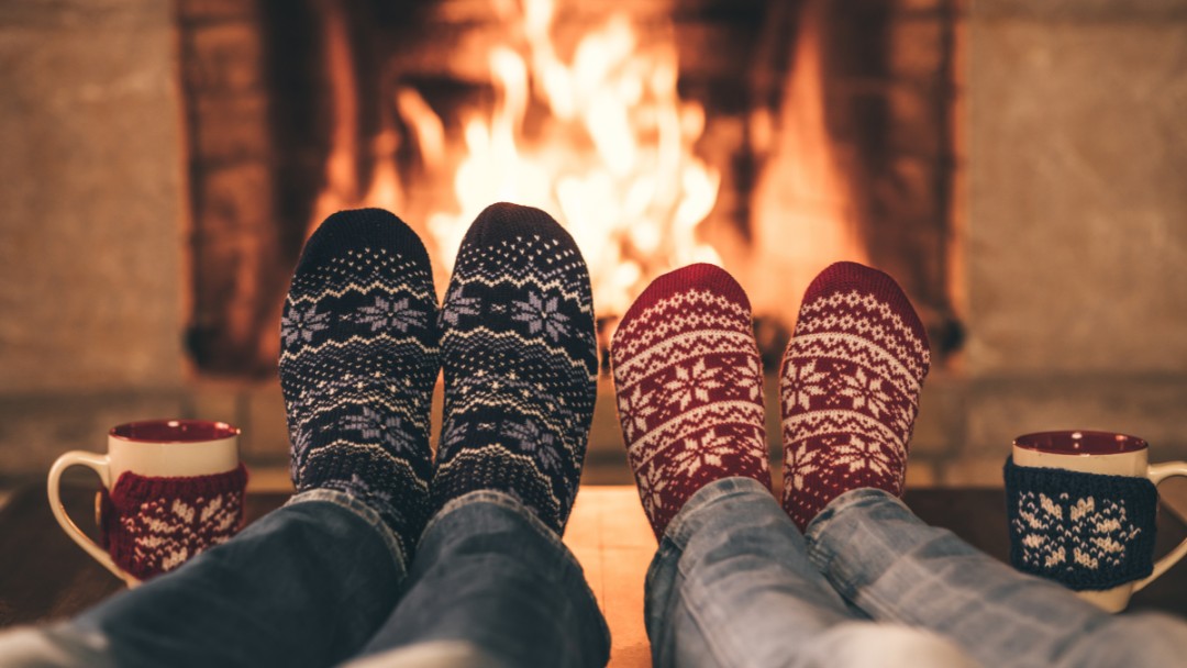 Cozy Fire with Comfy Socks | Homecare for Seniors with All Seasons Homecare